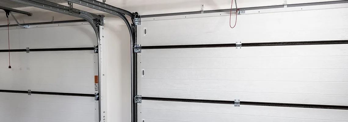 Fix Folding Garage Door Jerking in Hialeah